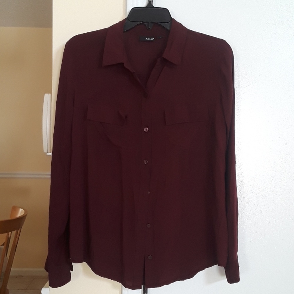 Deep wine colored button down shirt.
